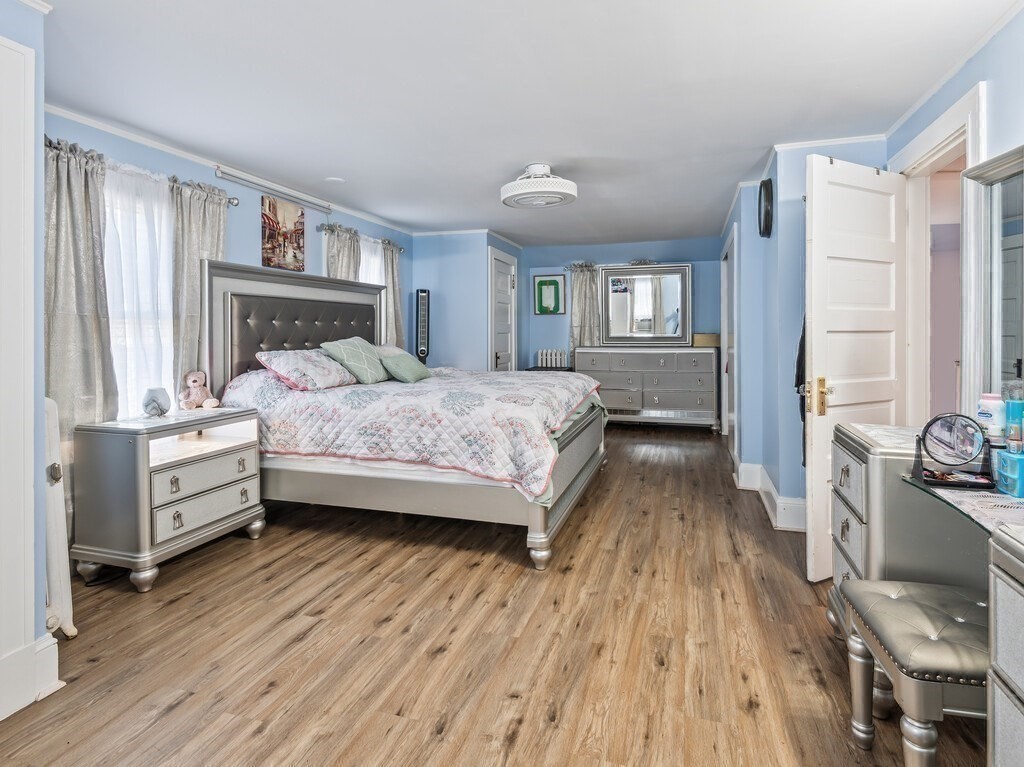 28 Maple Street Southbridge, MA 01550 - Photo 19 of 36 a bedroom with a bed and a dresser