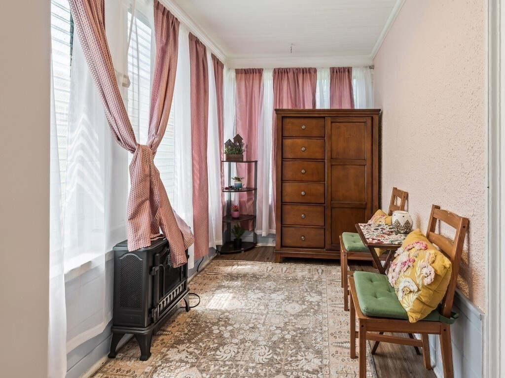 28 Maple Street Southbridge, MA 01550 - Photo 21 of 36 a view of a livingroom with furniture and a window