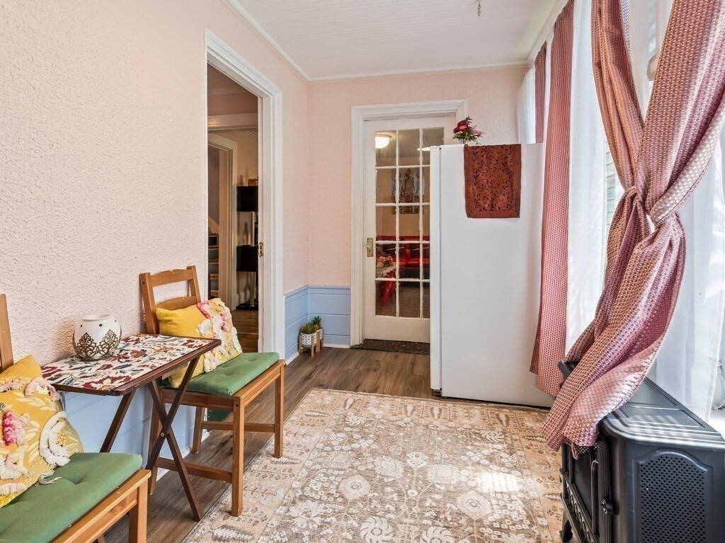 28 Maple Street Southbridge, MA 01550 - Photo 22 of 36 a view of a livingroom with furniture and a window