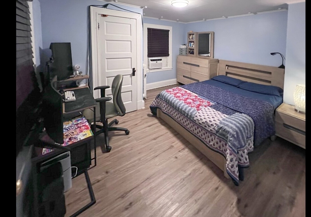 28 Maple Street Southbridge, MA 01550 - Photo 26 of 36 a bedroom with a bed furniture and a flat tv screen