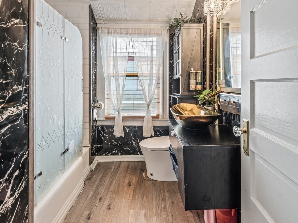 28 Maple Street Southbridge, MA 01550 - Photo 3 of 36 a living room with furniture and a large window