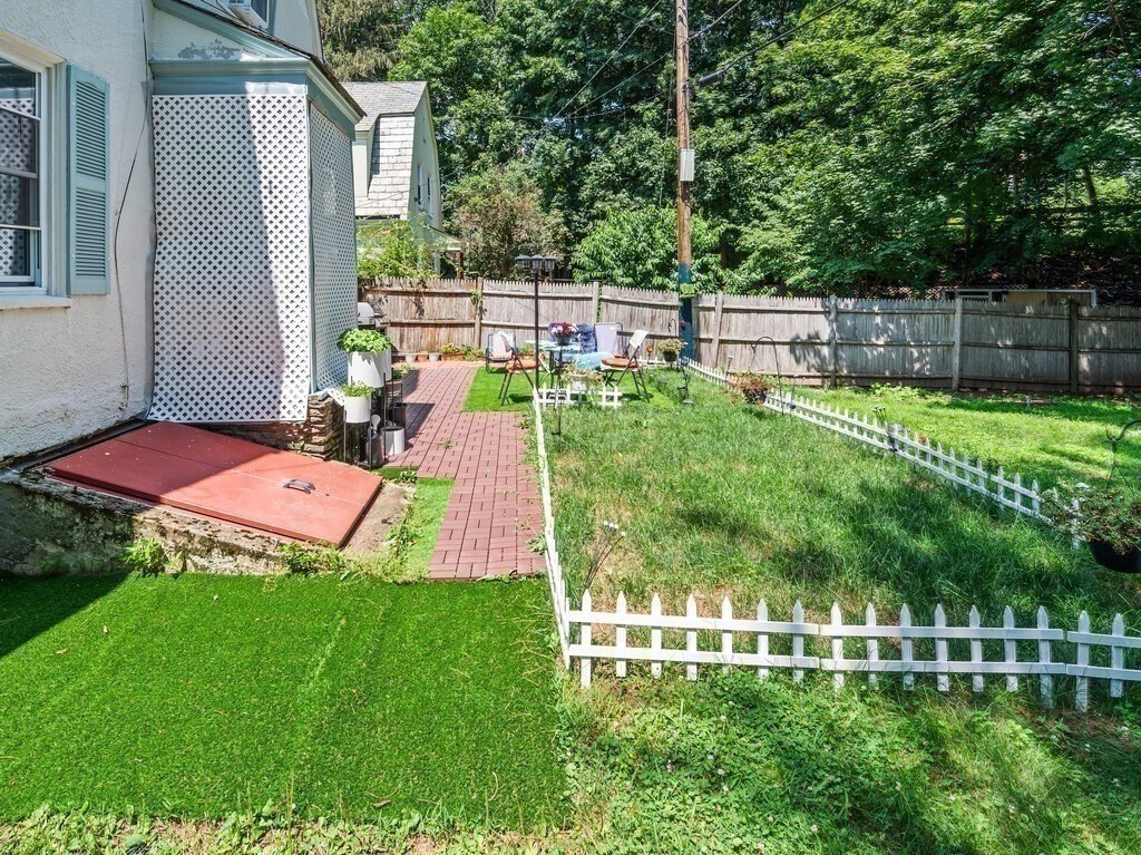 28 Maple Street Southbridge, MA 01550 - Photo 33 of 36 a view of a backyard with a garden
