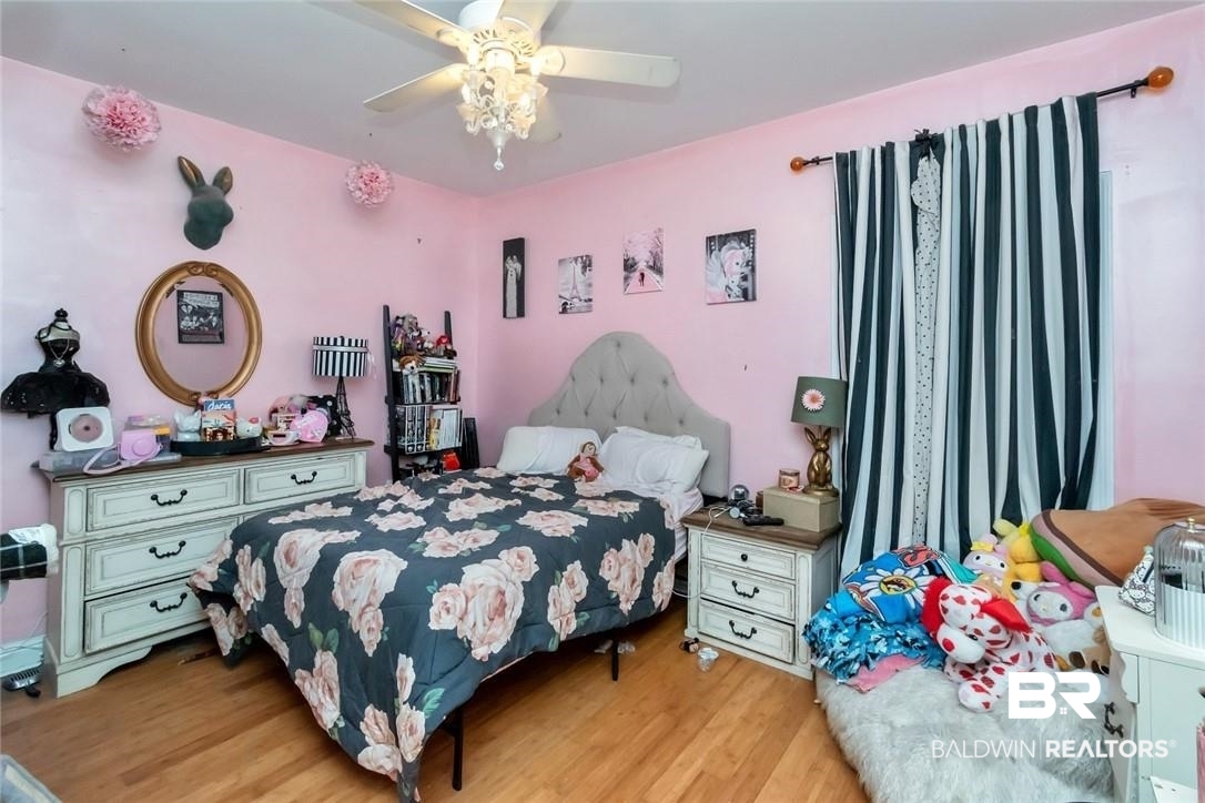 7170 Pierson Drive Mobile, AL 36619 - Photo 17 of 29 Bedroom with ceiling fan and light hardwood / wood-style flooring