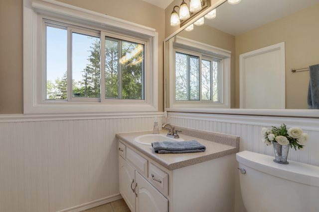 21W120 Everest Road Lombard, IL 60148 - Photo 22 of 33 a bathroom with a sink and a window