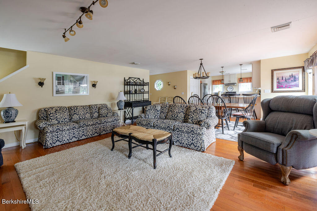 16 Heberts Cove Monterey, MA 01230 - Photo 14 of 47 a living room with furniture and a rug