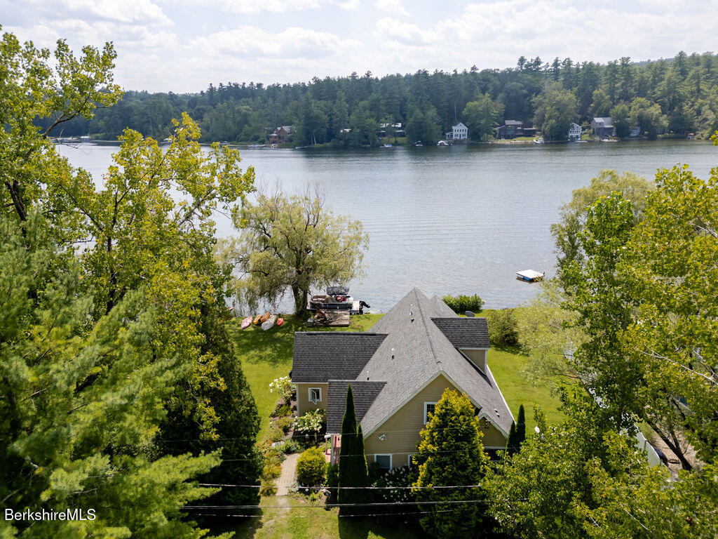 16 Heberts Cove Monterey, MA 01230 - Photo 2 of 47 an aerial view of a house with a lake view