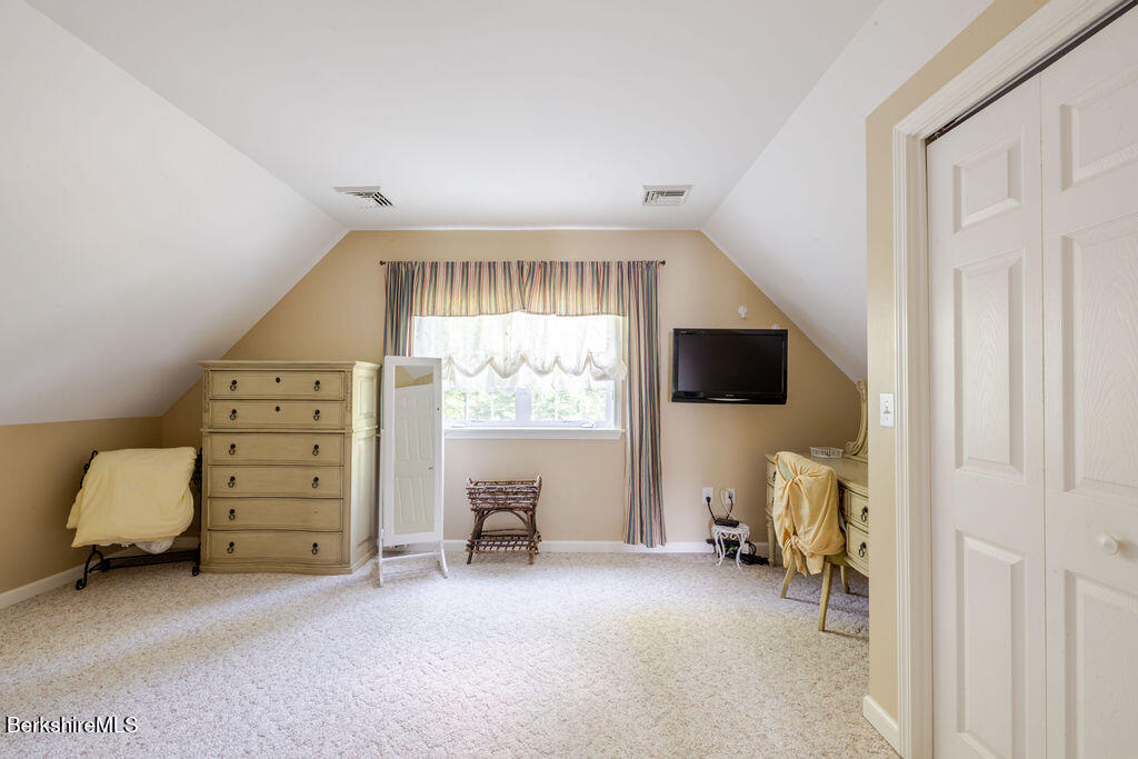 16 Heberts Cove Monterey, MA 01230 - Photo 28 of 47 a view of a livingroom with furniture and a window