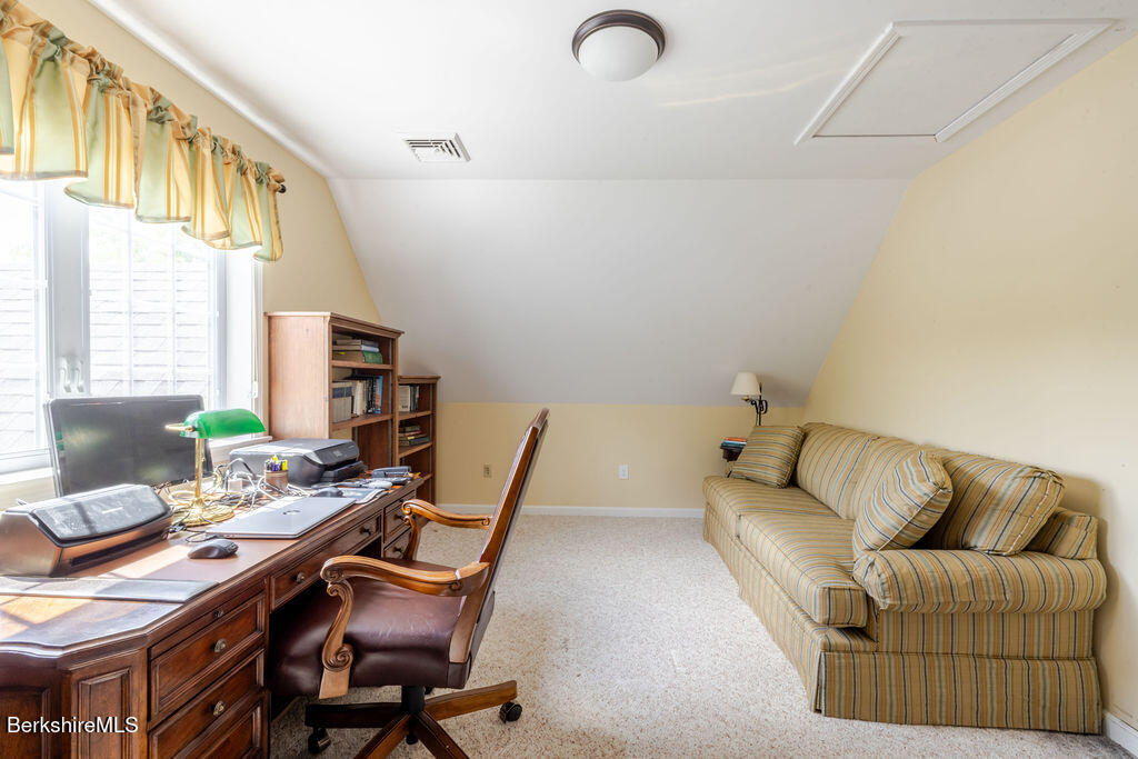 16 Heberts Cove Monterey, MA 01230 - Photo 32 of 47 a living room with furniture and a window