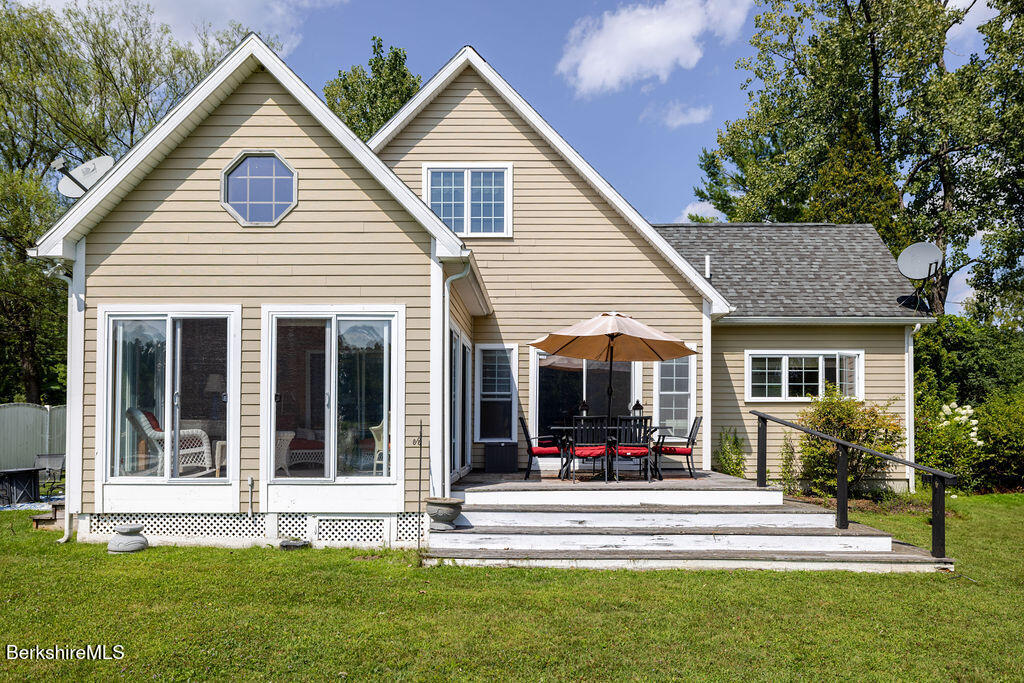 16 Heberts Cove Monterey, MA 01230 - Photo 34 of 47 a view of house and a yard with swimming pool