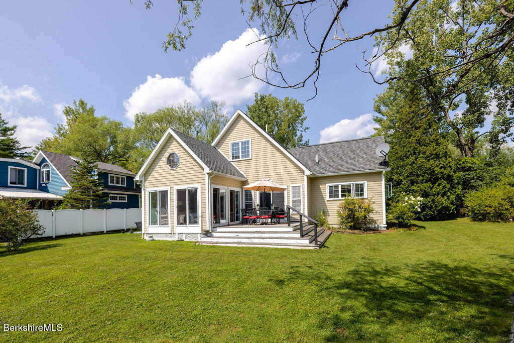 16 Heberts Cove Monterey, MA 01230 - Photo 35 of 47 a front view of house with yard and green space