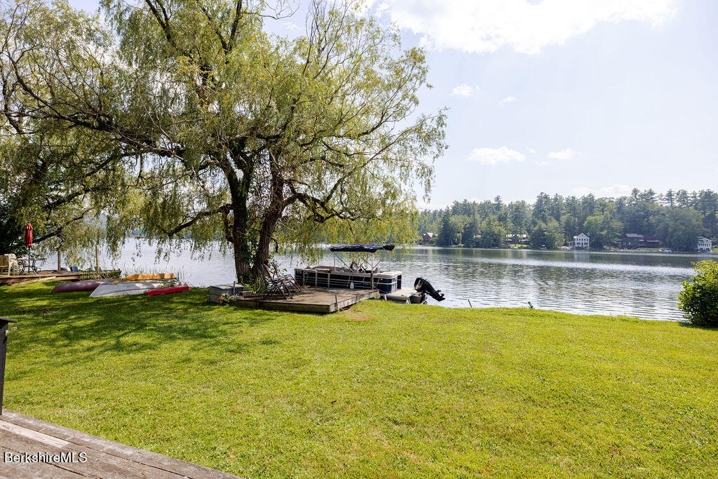 16 Heberts Cove Monterey, MA 01230 - Photo 4 of 47 a view of a lake with houses in the back