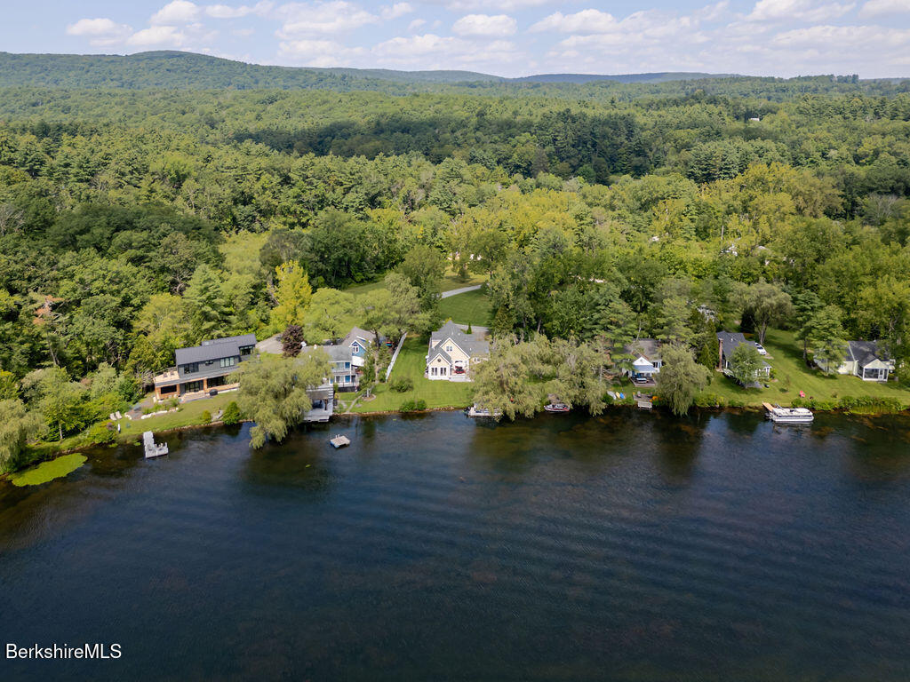 16 Heberts Cove Monterey, MA 01230 - Photo 43 of 47 a view of a lake with houses