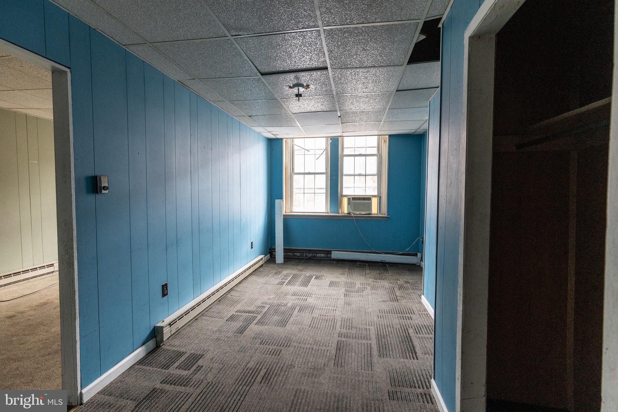 212 West Market Street, Unit A Pottsville, PA 17901 - Photo 3 of 10 a view of hallway with windows