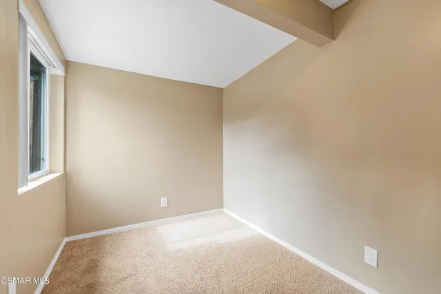 a view of a bathroom from a hallway