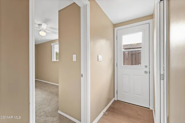 a bathroom with a shower a sink and a mirror