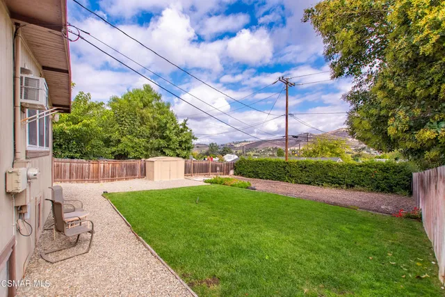a view of yard with patio