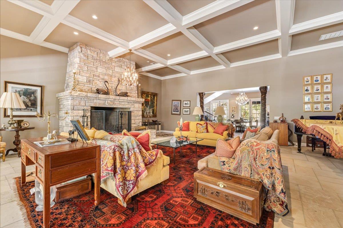 2727 Thomas Road Hollister, CA 95023 - Photo 11 of 83 a living room with furniture fireplace and a flat screen tv