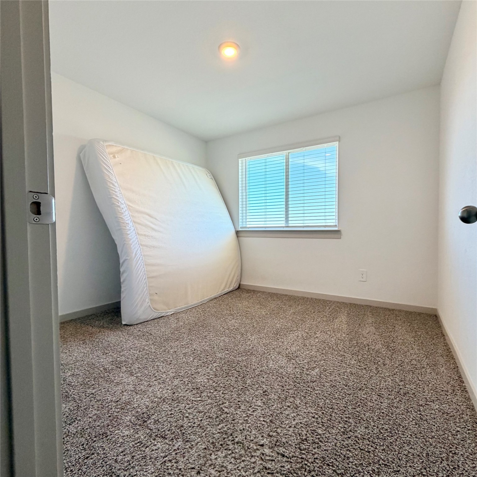 10610 Great Basin Drive Rosharon, TX 77583 - Photo 13 of 14 an empty room with windows