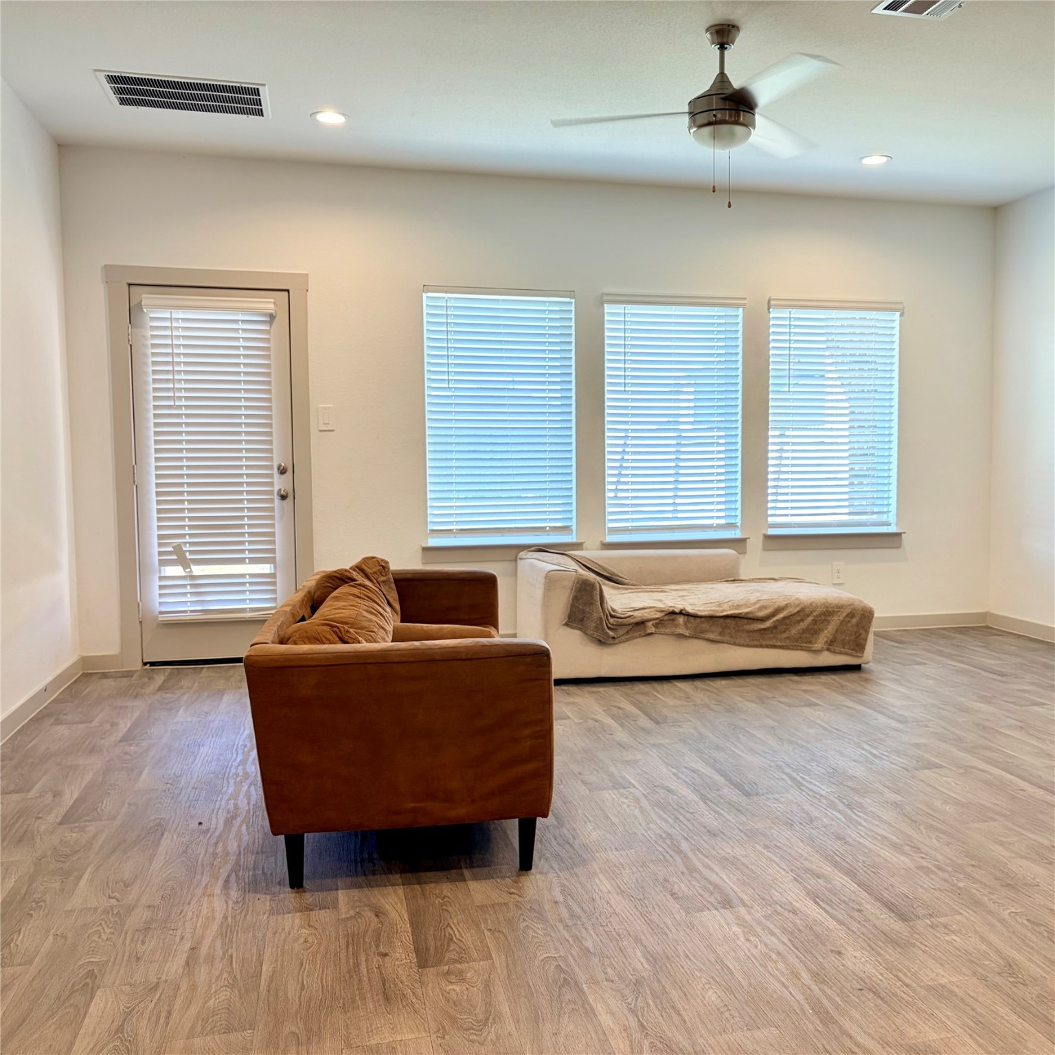 10610 Great Basin Drive Rosharon, TX 77583 - Photo 3 of 14 a living room with furniture and a large window