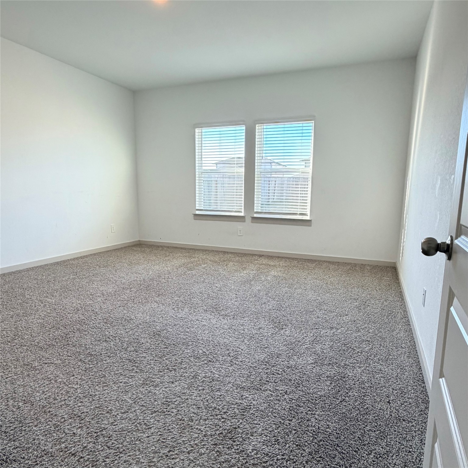 10610 Great Basin Drive Rosharon, TX 77583 - Photo 4 of 14 an empty room with a empty space and a window