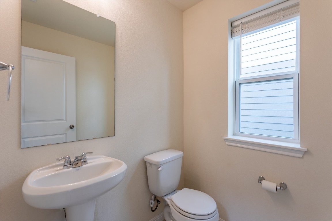 17927 Papaveri Way Pflugerville, TX 78660 - Photo 11 of 26 Downstairs half bathroom