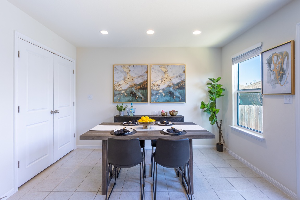 17927 Papaveri Way Pflugerville, TX 78660 - Photo 13 of 26 a view of a dining room with furniture window and outside view