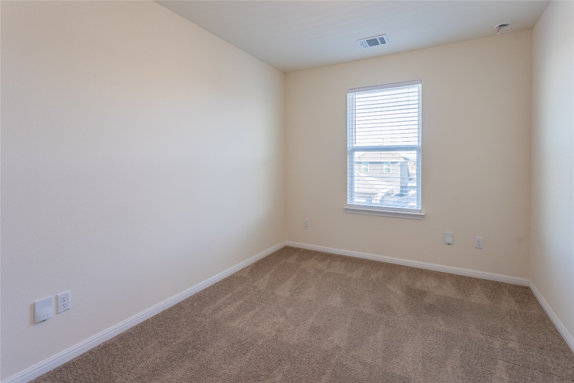 17927 Papaveri Way Pflugerville, TX 78660 - Photo 21 of 26 an empty room with a window
