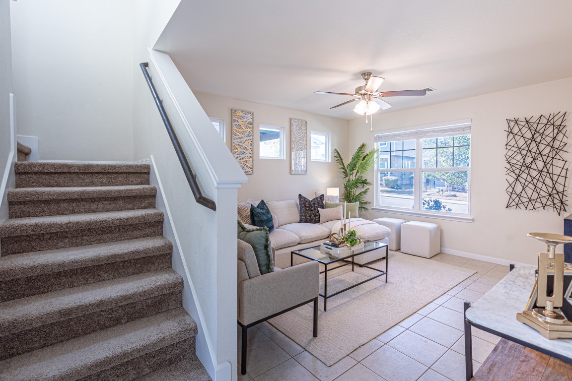 17927 Papaveri Way Pflugerville, TX 78660 - Photo 10 of 26 a living room with furniture and wooden floor