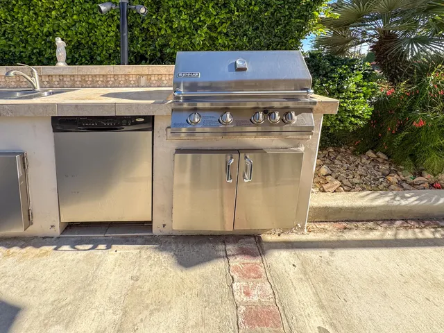 a view of a fireplace with wooden fence