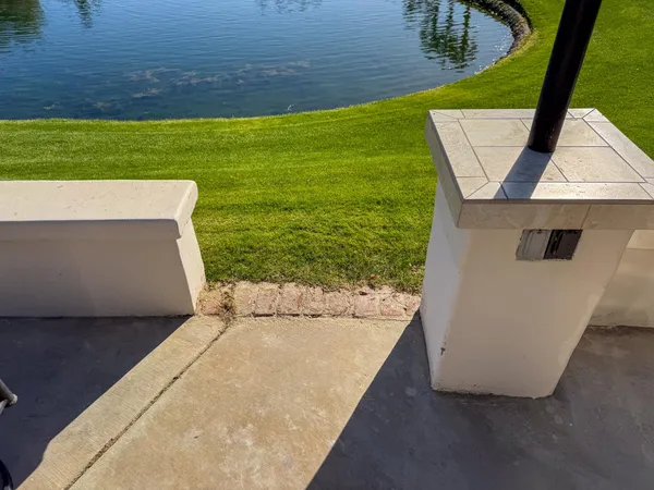 a view of a swimming pool with an outdoor space