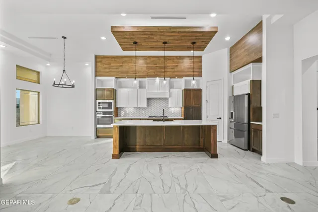 a view of an entryway with chandelier