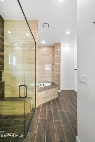 a bathroom with a sink a vanity and a mirror