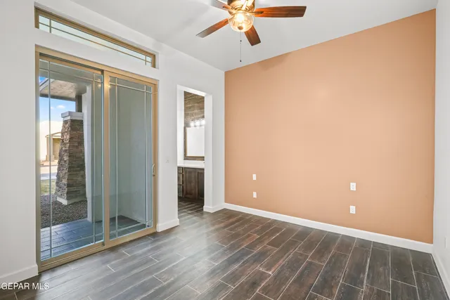 a bathroom with a toilet and a bathtub