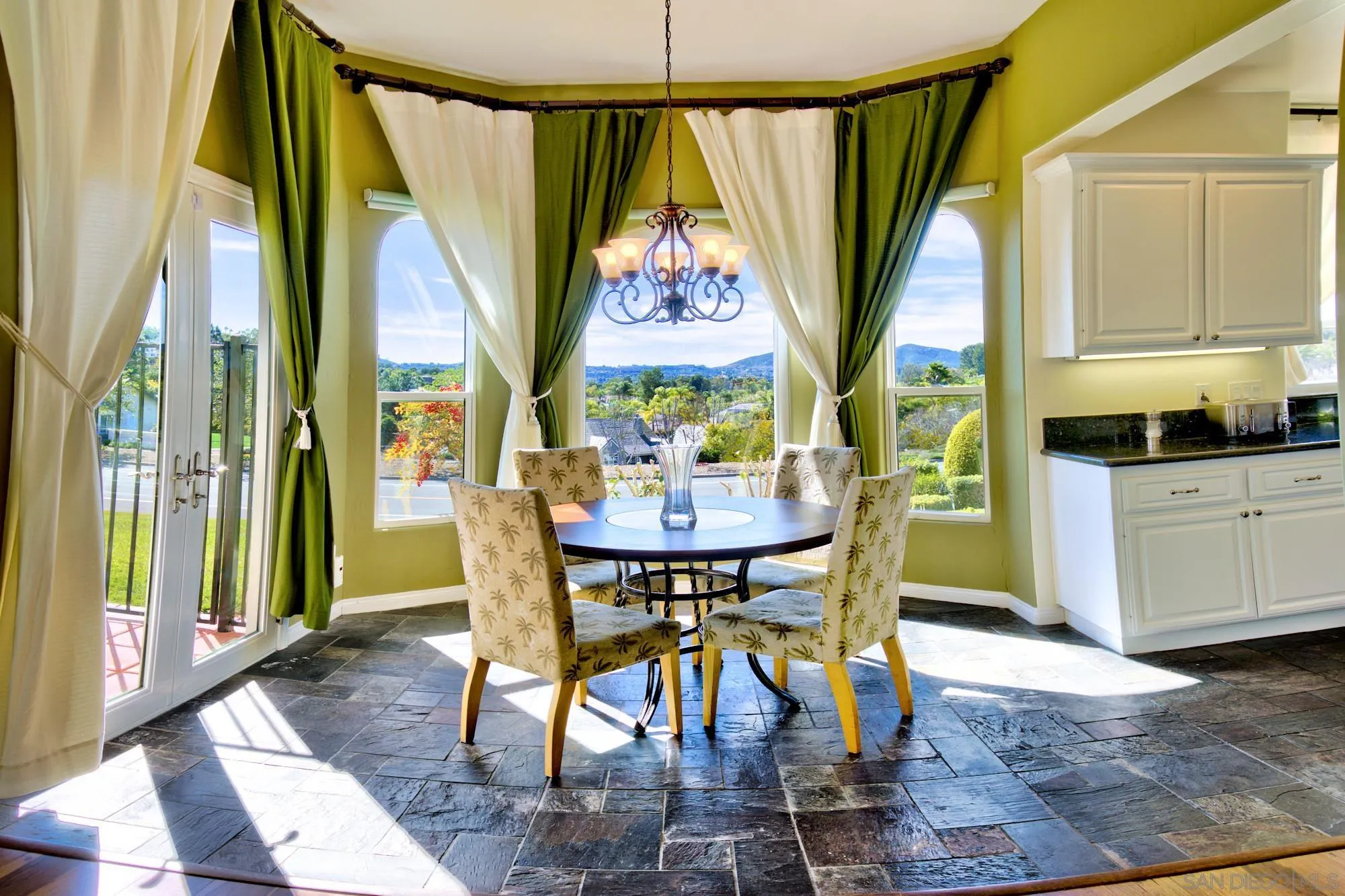 17843 Valle Verde Road Poway, CA 92064 - Photo 23 of 70 a view of a dining room with furniture and a window