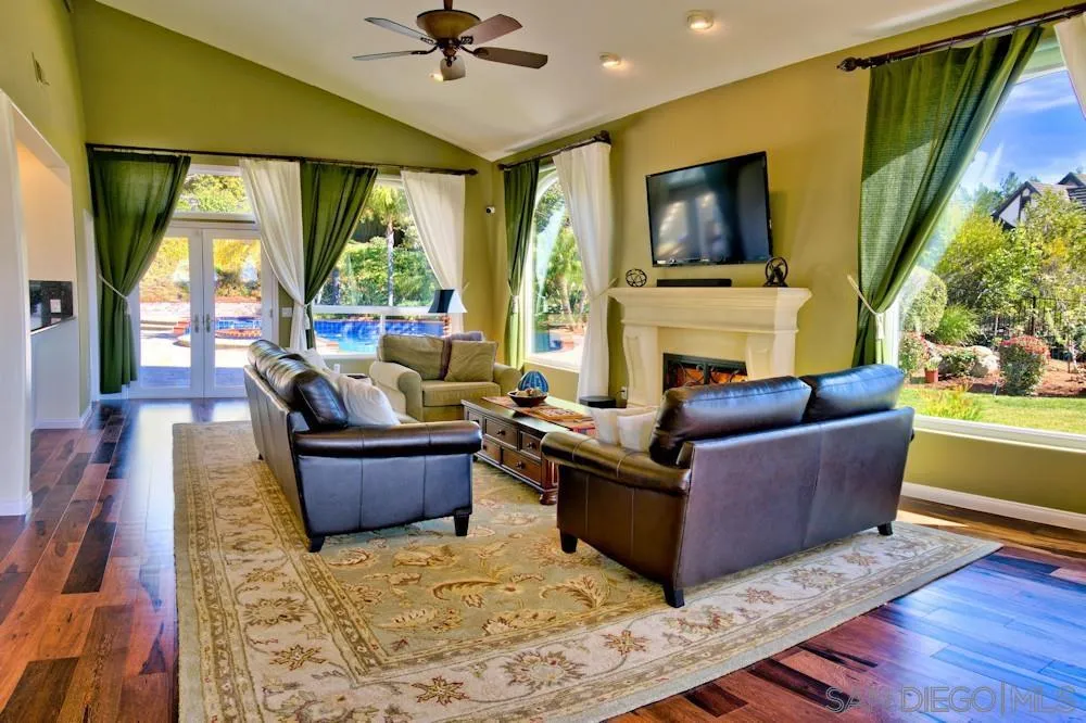 17843 Valle Verde Road Poway, CA 92064 - Photo 24 of 70 a living room with furniture and a flat screen tv