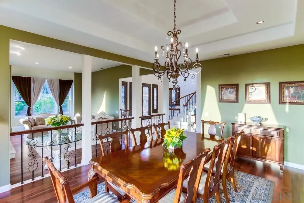 17843 Valle Verde Road Poway, CA 92064 - Photo 31 of 70 a view of a dining room with furniture window and wooden floor