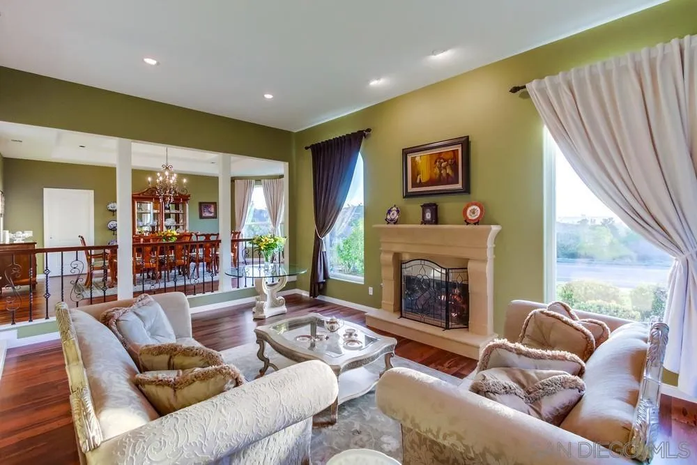 17843 Valle Verde Road Poway, CA 92064 - Photo 32 of 70 a living room with furniture and a fireplace