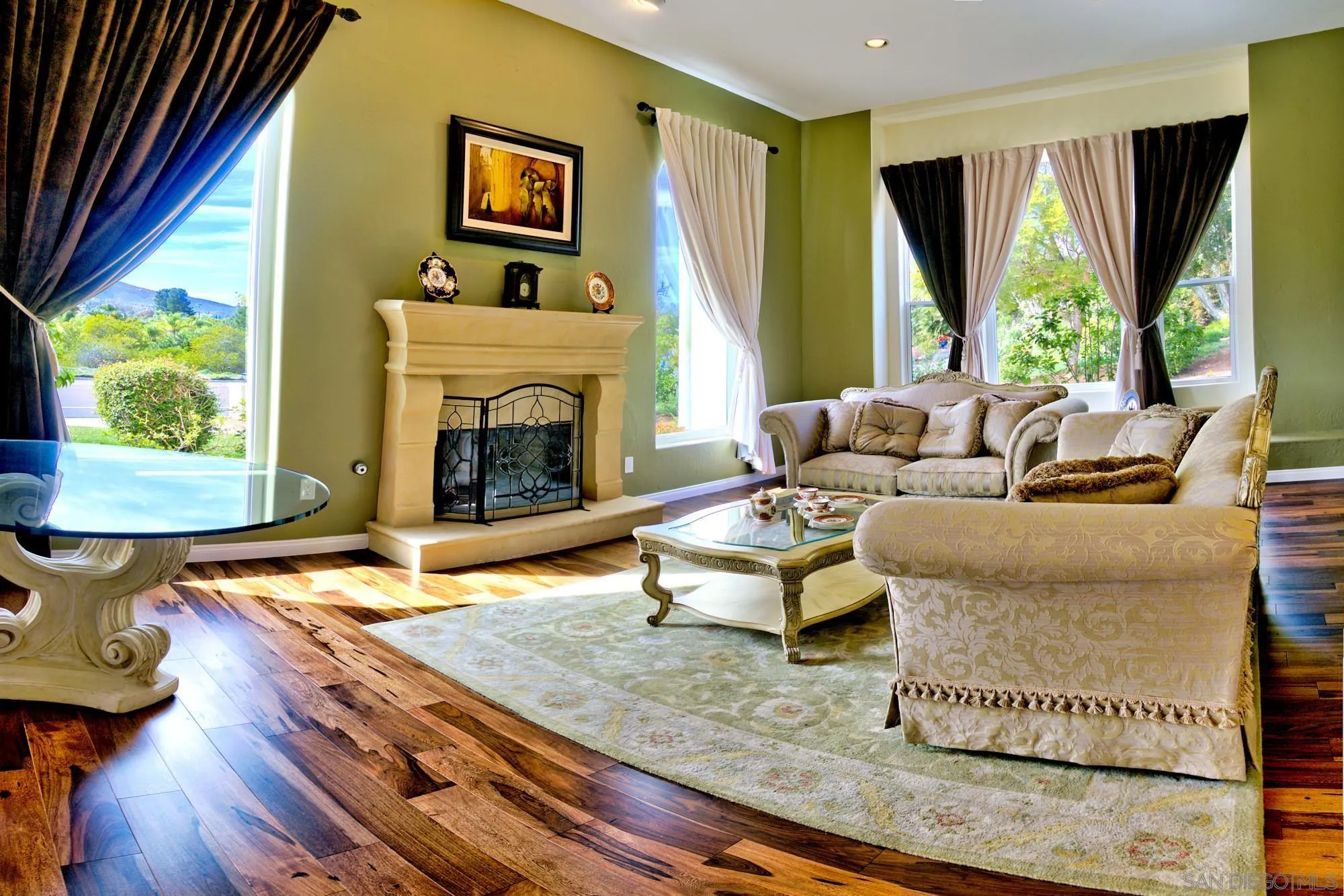 17843 Valle Verde Road Poway, CA 92064 - Photo 33 of 70 a living room with furniture and a fireplace