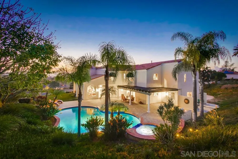 17843 Valle Verde Road Poway, CA 92064 - Photo 4 of 70 a view of a lake with a building in the background