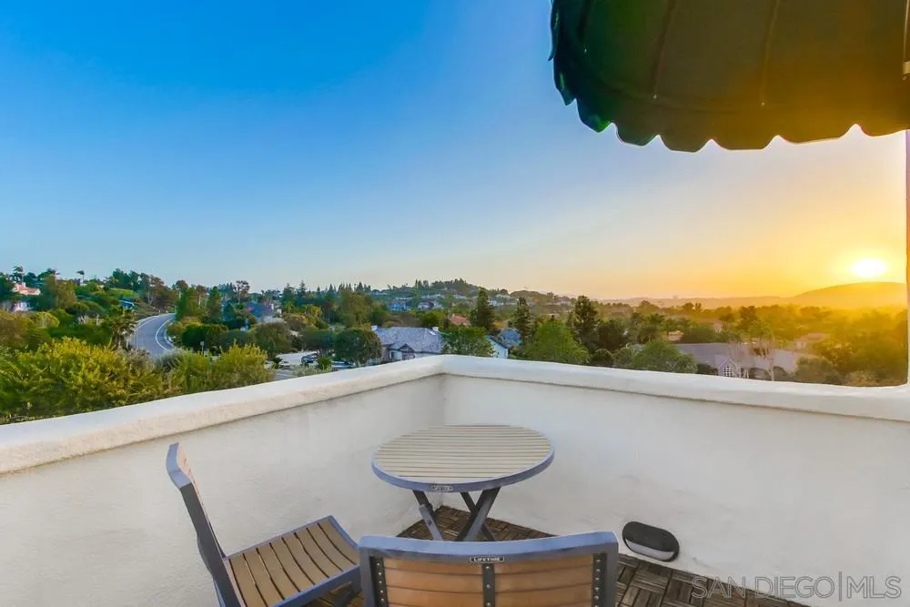 17843 Valle Verde Road Poway, CA 92064 - Photo 41 of 70 a view of a balcony with chair and table