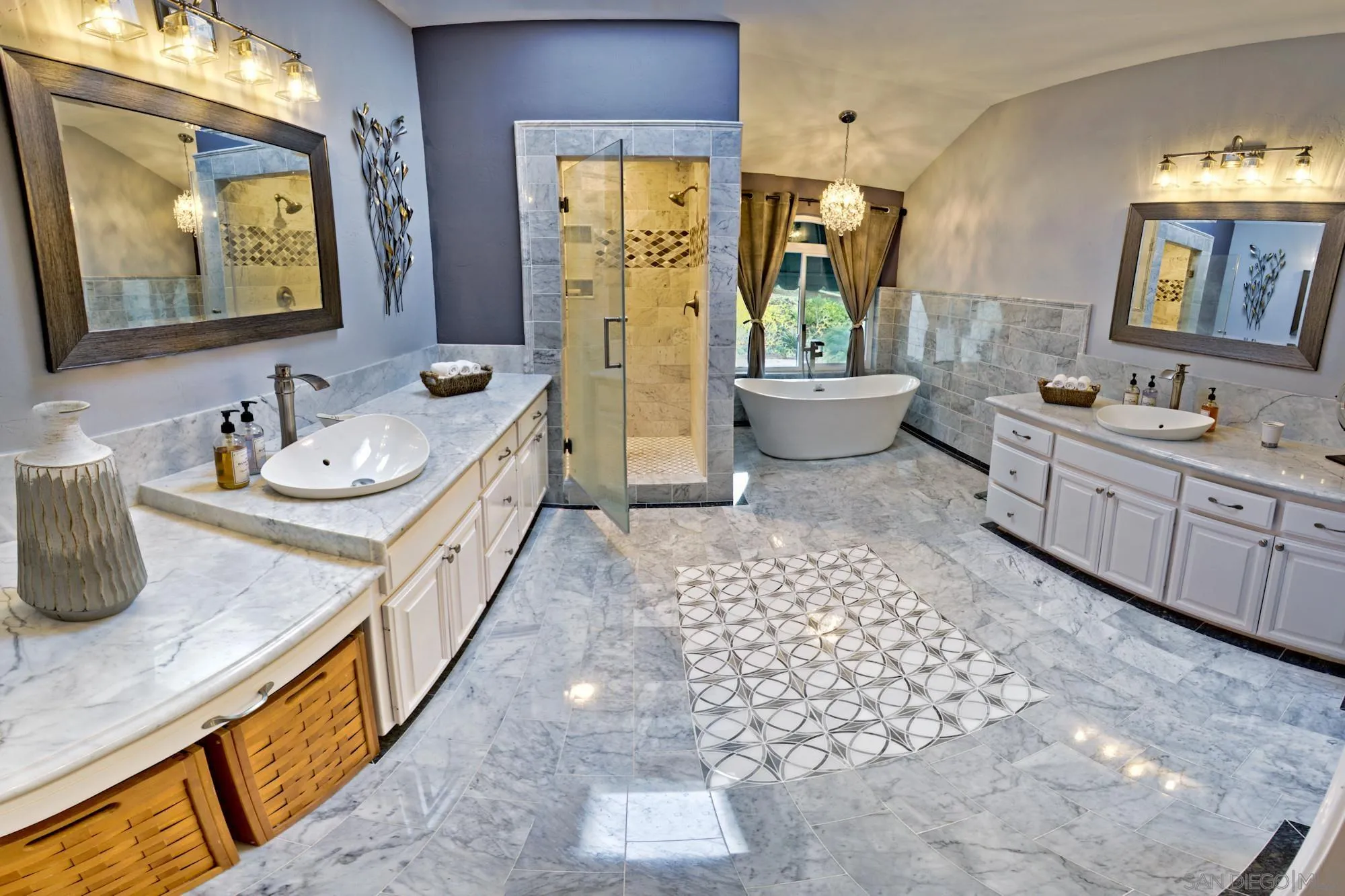 17843 Valle Verde Road Poway, CA 92064 - Photo 42 of 70 a spacious bathroom with a double vanity sink a mirror and a bathtub