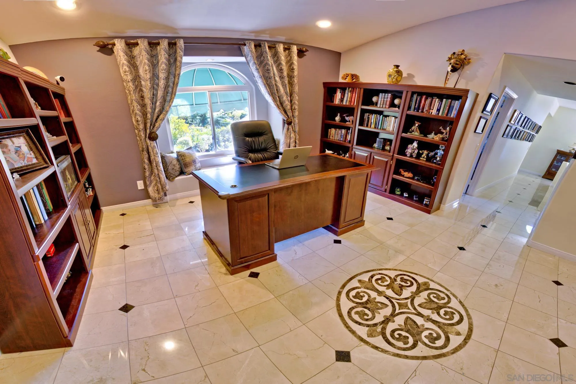17843 Valle Verde Road Poway, CA 92064 - Photo 48 of 70 a view of walk in closet with clothes and shoes