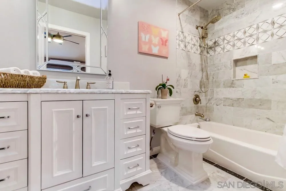 17843 Valle Verde Road Poway, CA 92064 - Photo 50 of 70 a bathroom with a sink a toilet and bathtub