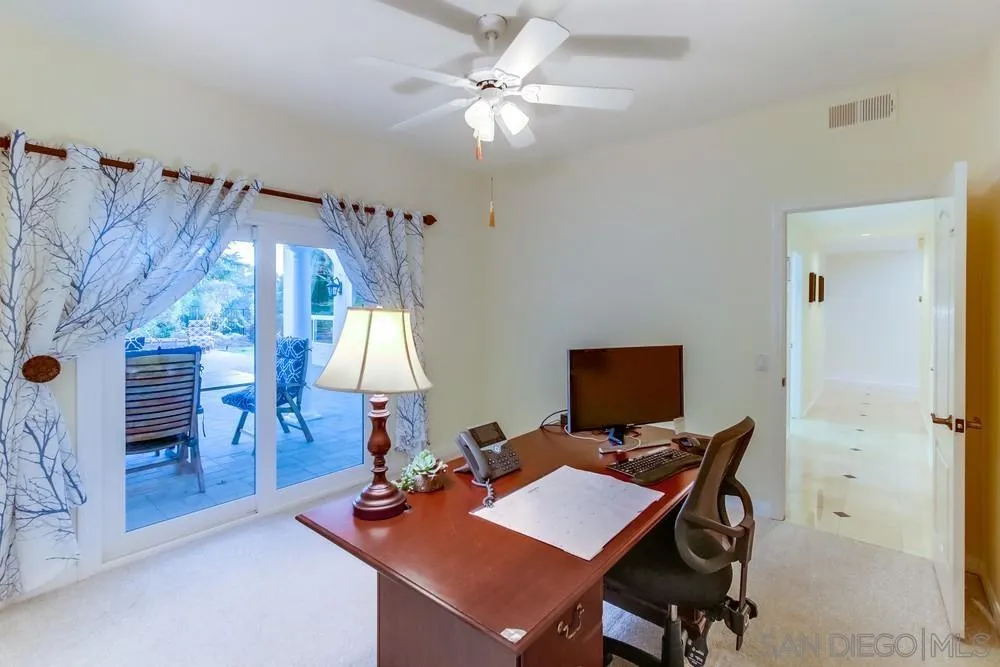 17843 Valle Verde Road Poway, CA 92064 - Photo 55 of 70 a view of a workspace with furniture