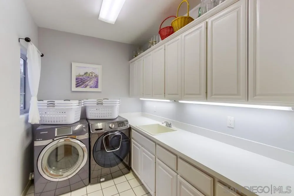 17843 Valle Verde Road Poway, CA 92064 - Photo 57 of 70 a utility room with dryer and washer