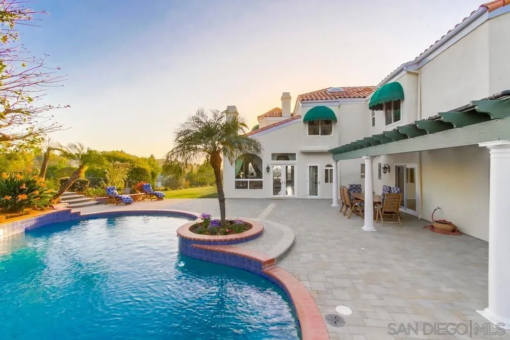 17843 Valle Verde Road Poway, CA 92064 - Photo 61 of 70 a swimming pool with outdoor seating and yard