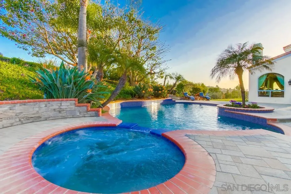 17843 Valle Verde Road Poway, CA 92064 - Photo 63 of 70 a view of a swimming pool with an outdoor seating