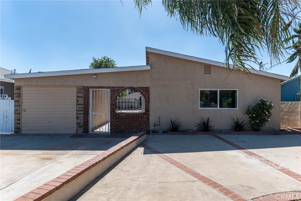 a view of backyard with potted plants