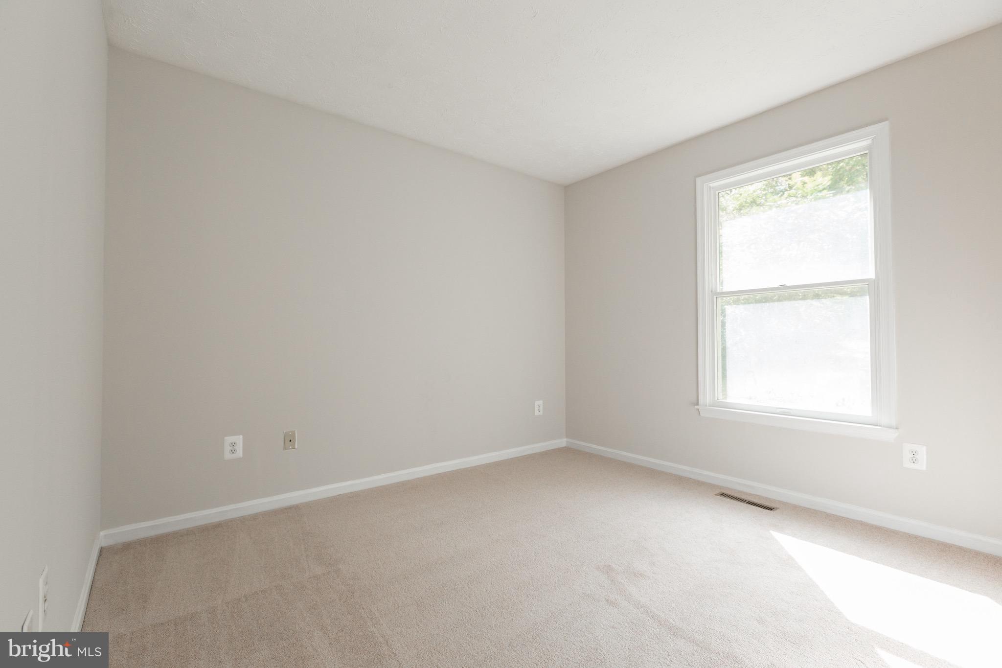 75 Locust Tree Lane Front Royal, VA 22630 - Photo 15 of 27 an empty room with a window