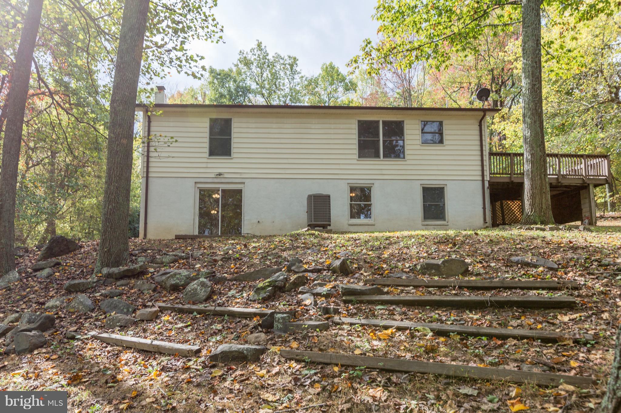 75 Locust Tree Lane Front Royal, VA 22630 - Photo 25 of 27 a house with trees in the background